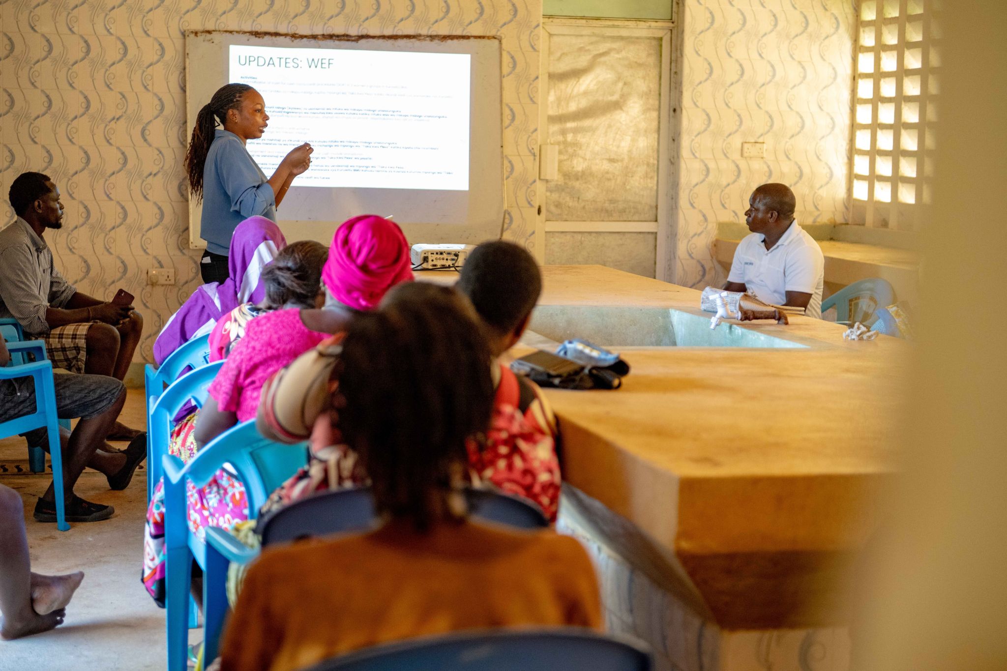 Women in a capacity building training session with Oceans Alive